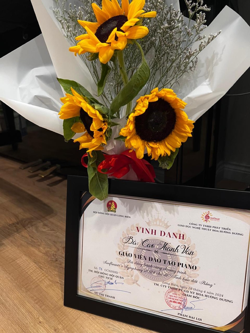 Framed teacher appreciation certificate with a bouquet of sunflowers from Sunflower's Symphony 2024